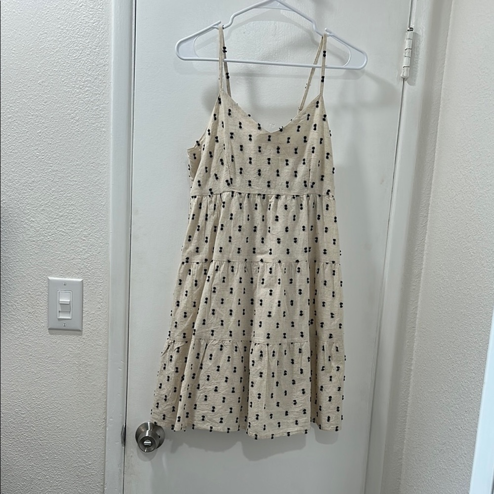 Cream Sleeveless Dress with Black Pattern